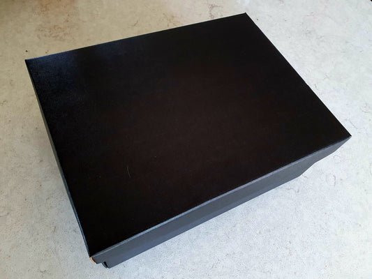 Black storage box for Christmas crackers