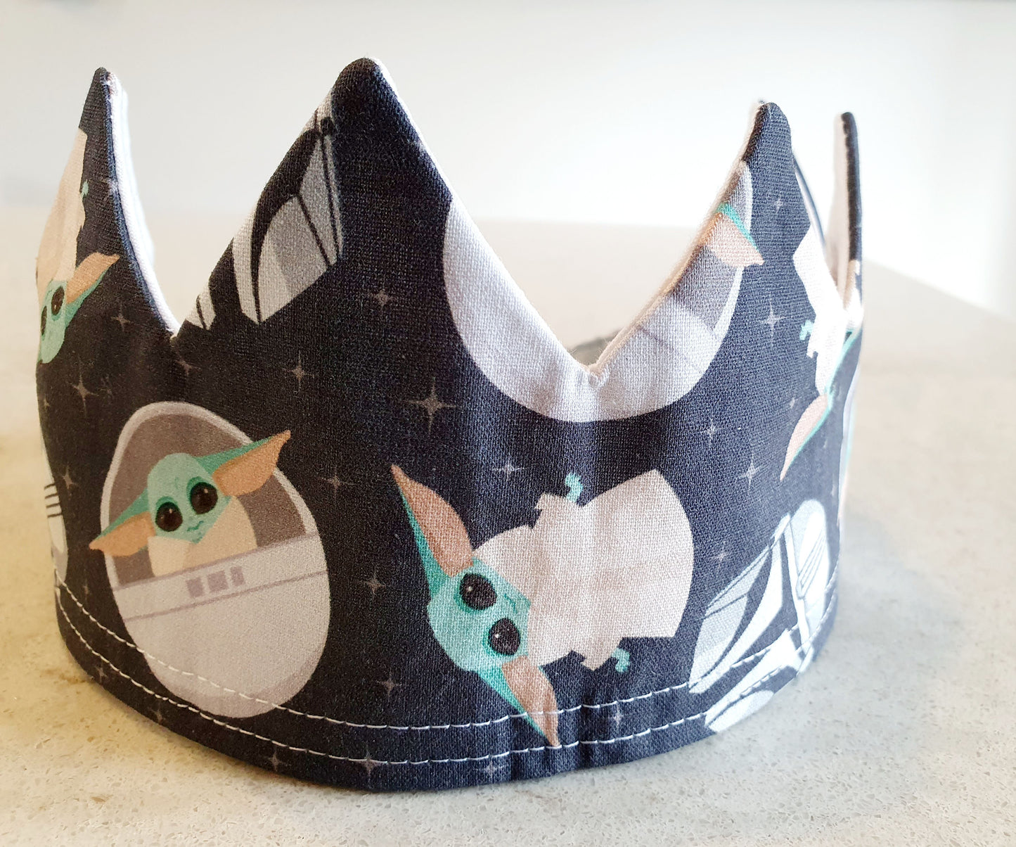 Grogu Reusable, Reversible Fabric Party Crown; perfect for your next birthday party. 